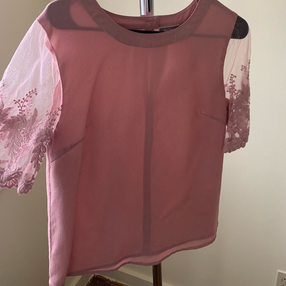 Pink blouse with lace
